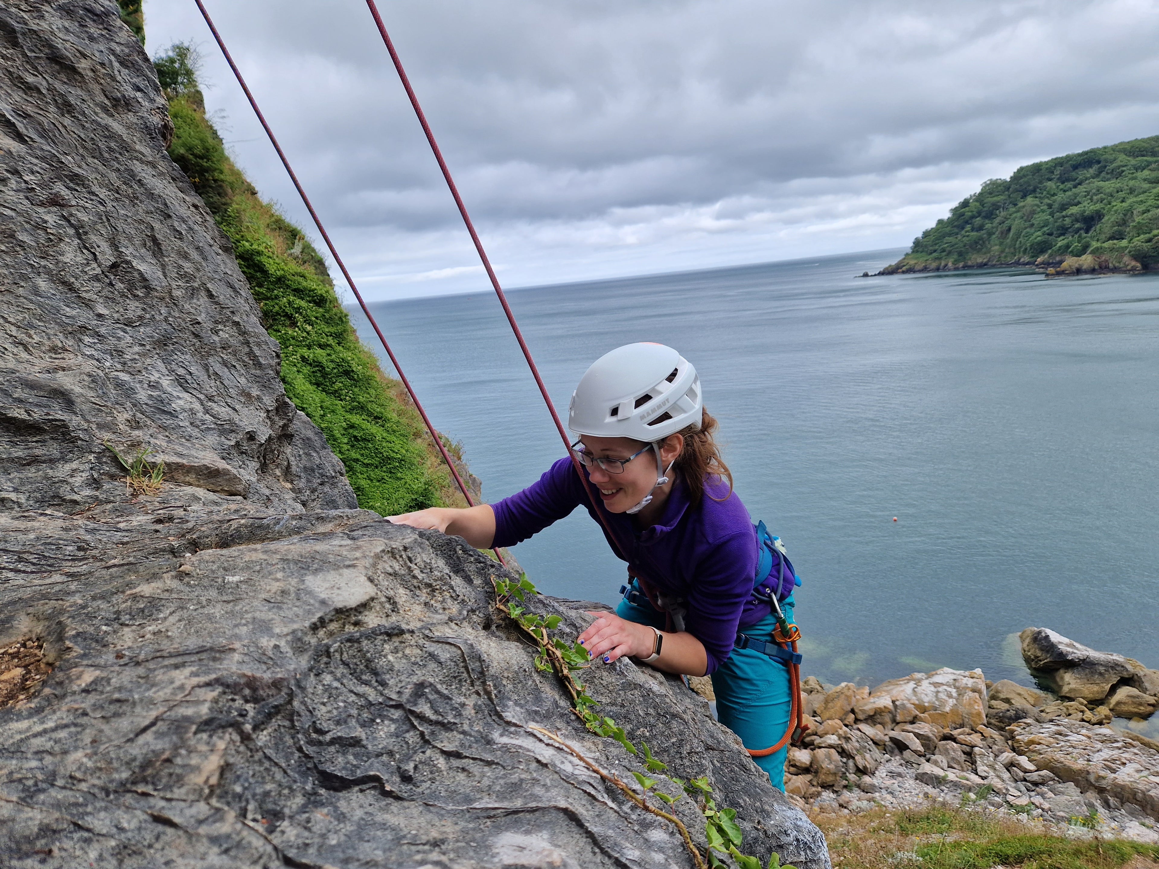 Hannah from crux clothing climbing at Anstey's Cove.